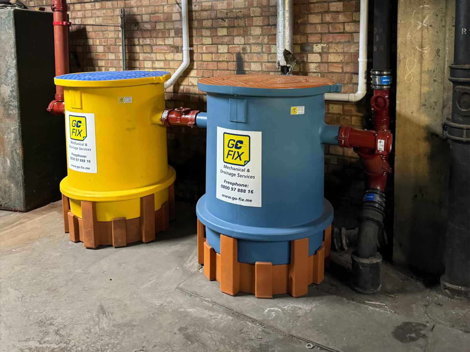 Go-Fix team ensuring compliance with UK environmental regulations for FOG management.