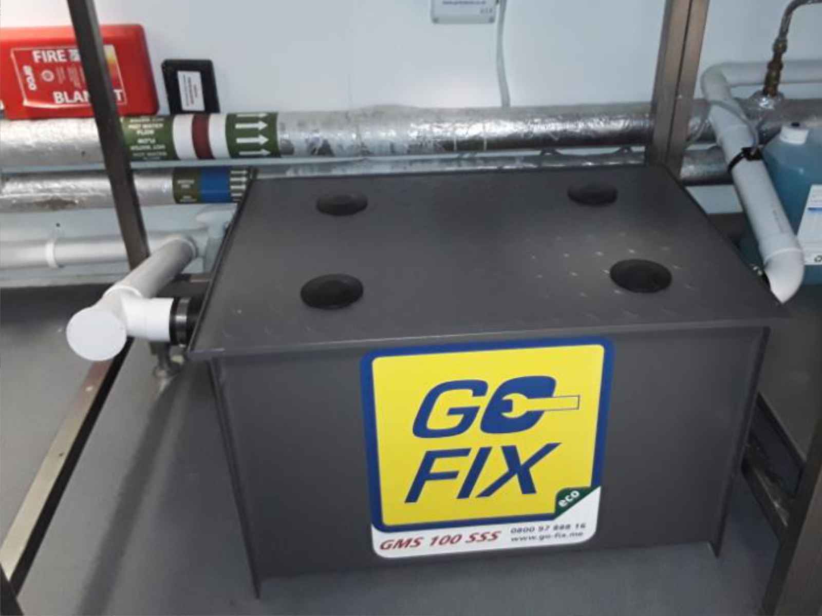 Go-Fix engineer installing a commercial grease trap.