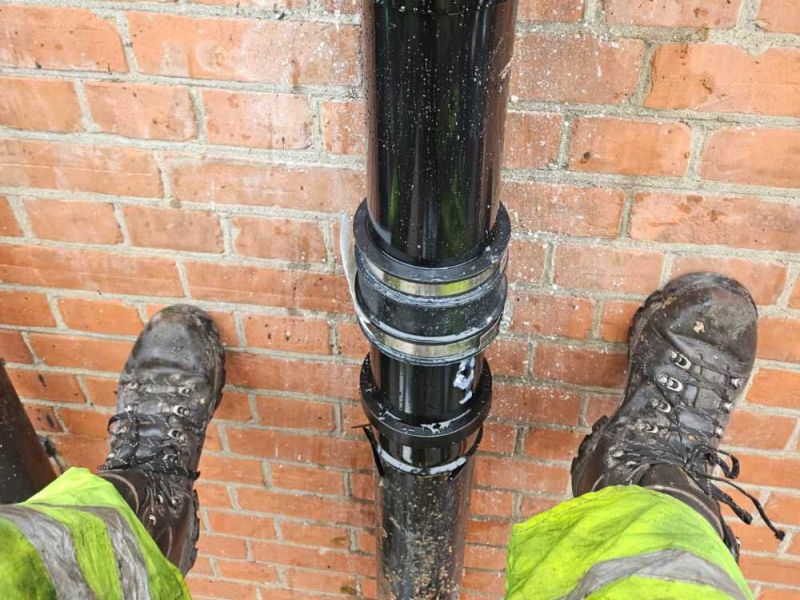 Go-Fix engineer performing specialist abseil and rope access services for high-level maintenance.