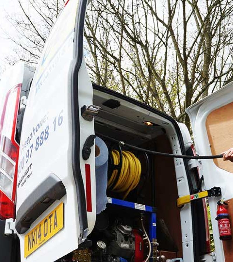Go-Fix work van with professional gutter cleaning equipment.