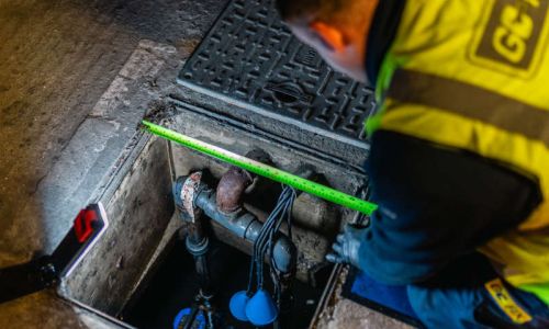 Go-Fix engineer repairing and maintaining a water pump system.